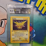 1999 POKEMON FOSSIL 1ST EDITION HOLO #15/62 ZAPDOS HGA 8.5 CERT YEUQRC8T5Z