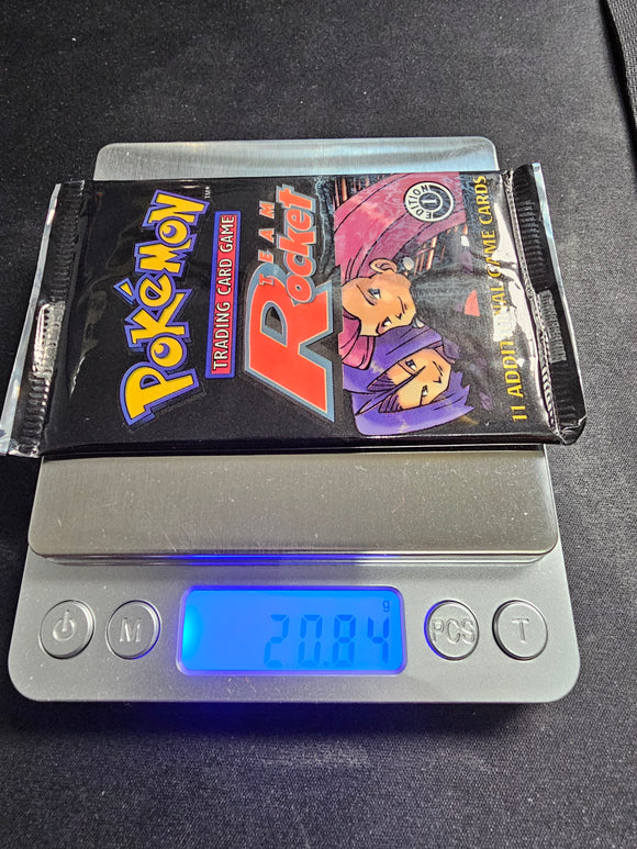 Wizards of the Coast 1st Edition Team Rocket Booster Pack 20.84 grams