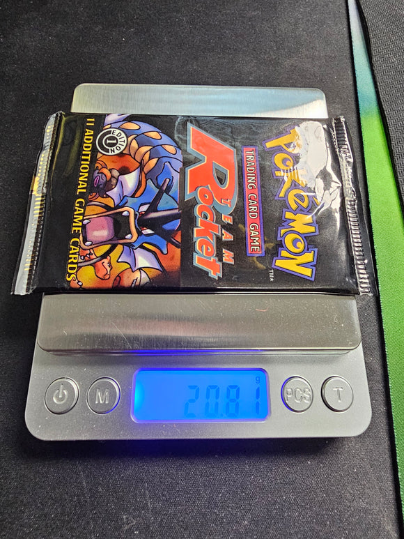 Wizards of the Coast 1st Edition Team Rocket Booster Pack 20.81 grams